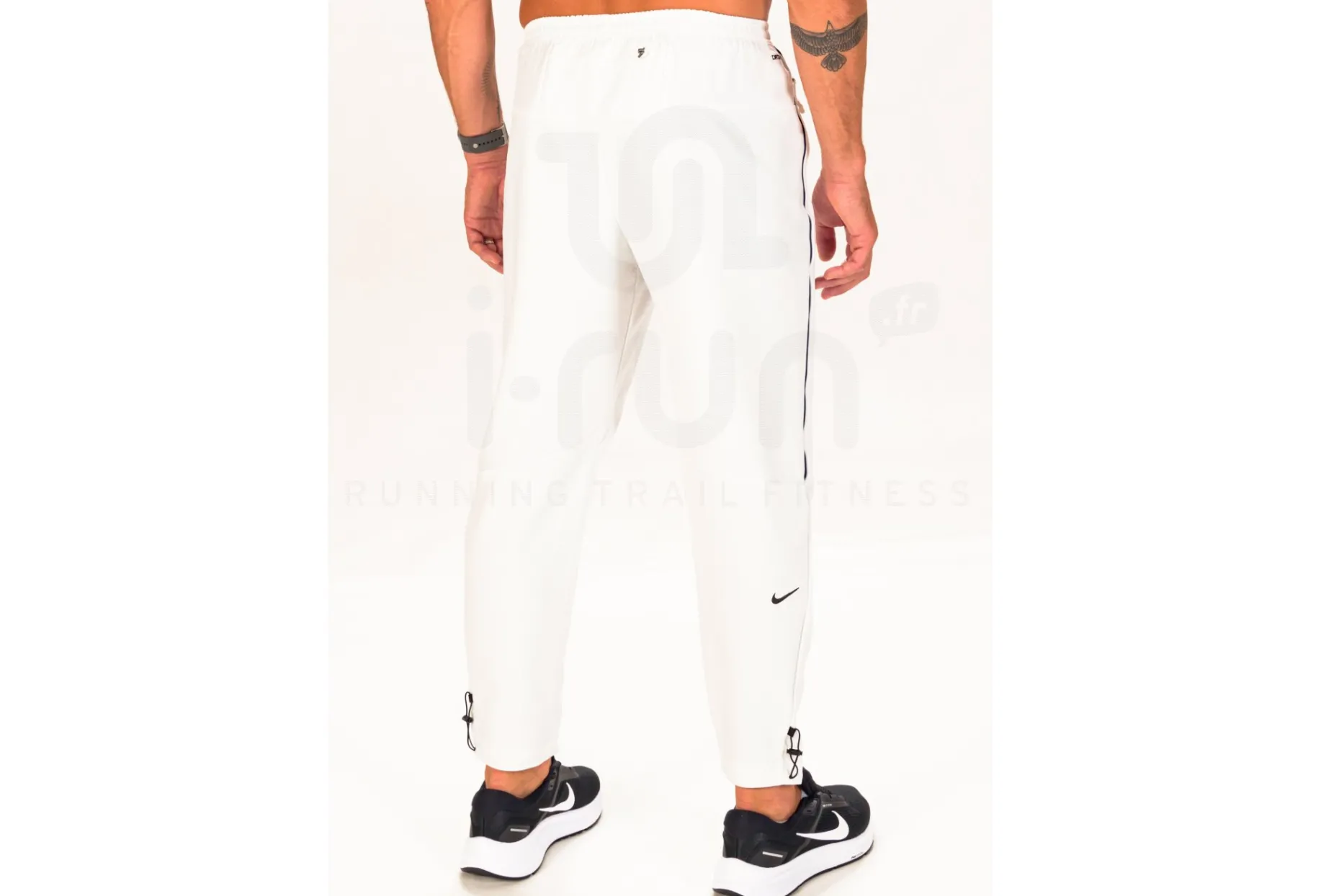 Nike pantalón Challenger Track Club